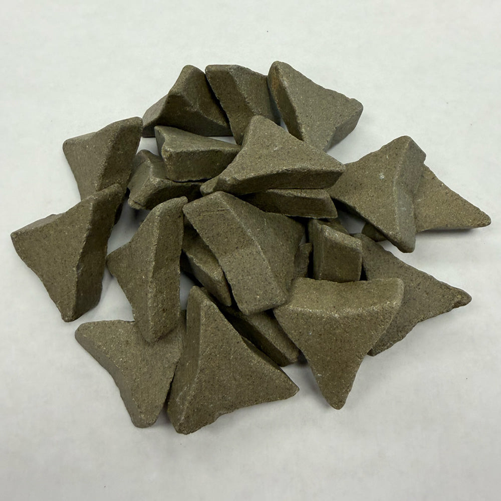 Small pile of C-ACTS-22 03 D+ ceramic media