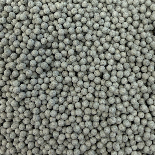 Close-up of C-SPH 2mm C precision ceramic media