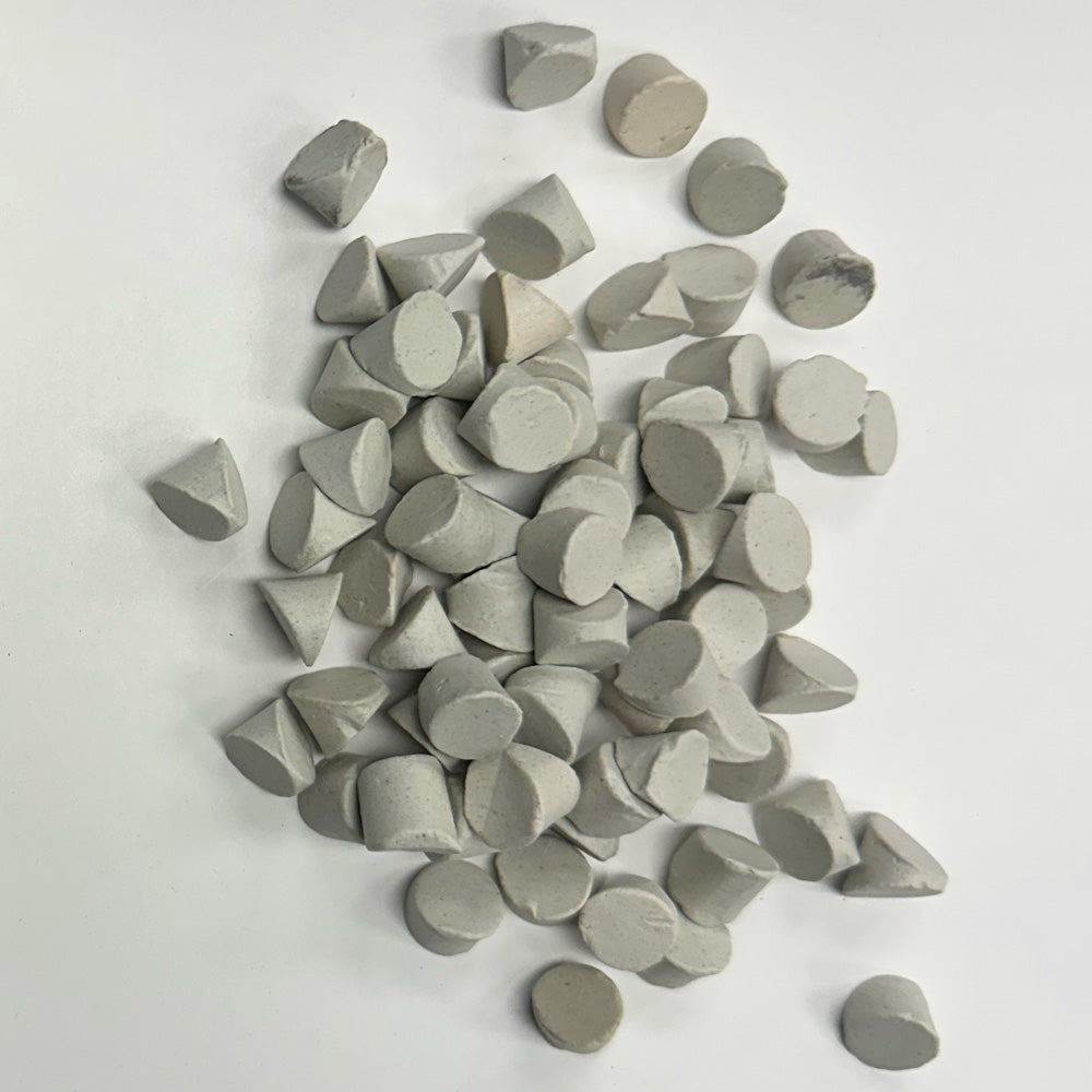 Small pile of C-TRIC 02 A+ ceramic media