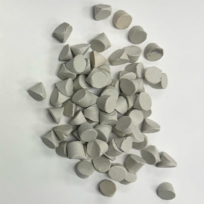 Small pile of C-TRIC 02 A+ ceramic media