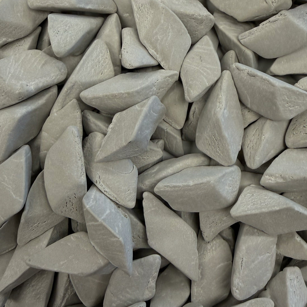 Close-up of EF-0900 TRI 01 Eco-Flex™ dry tumbling media
