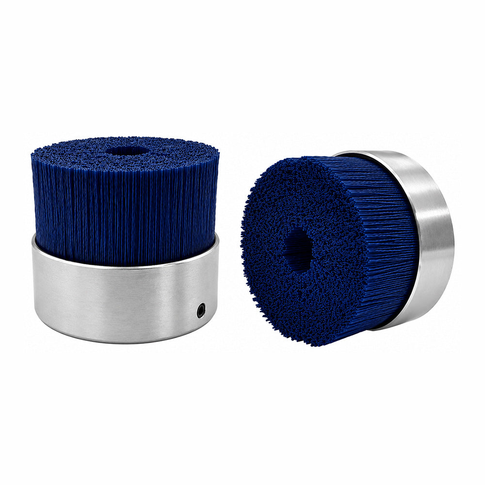Blue abrasive filament max density metal hub brush for aggressive burr removal and deburring of stainless steel and hard alloys.