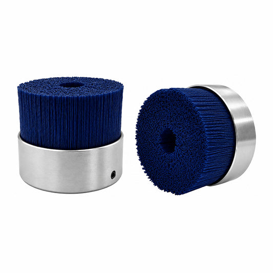 Blue abrasive filament max density metal hub brush for aggressive burr removal and deburring of stainless steel and hard alloys.